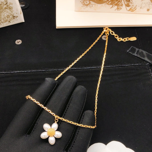 Dior Gold Brass Sunburst Necklace
