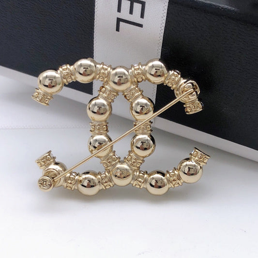Chanel Brass & Sterling Silver Pearl Brooch