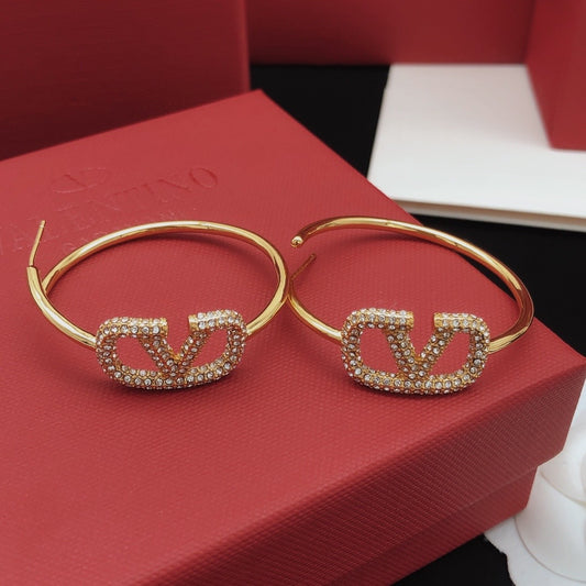 Valentino Brass Round Earrings