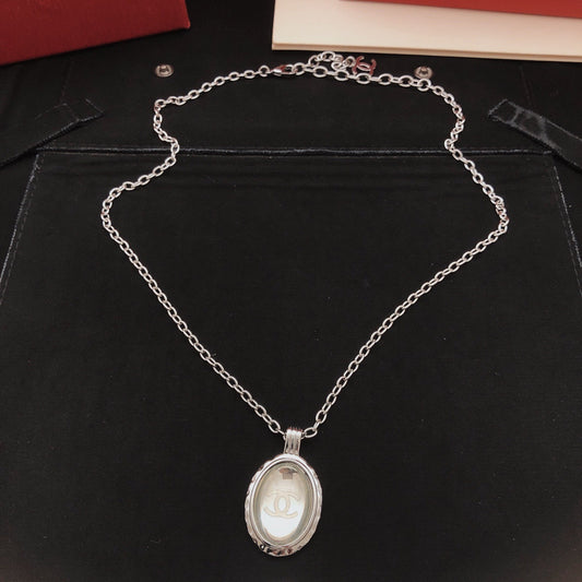Chanel White Brass Round Necklace