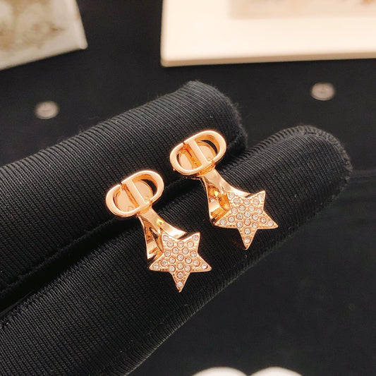 Dior Gold Brass Star Earrings