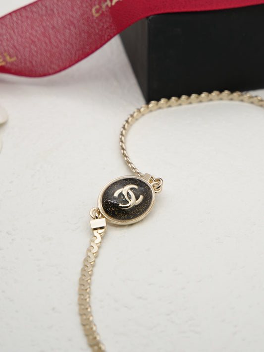 Chanel Brass Logo Earrings