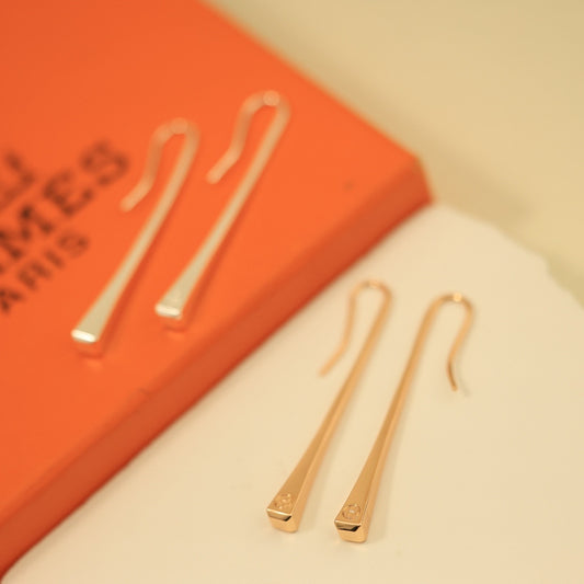 Hermes Gold Logo Earrings