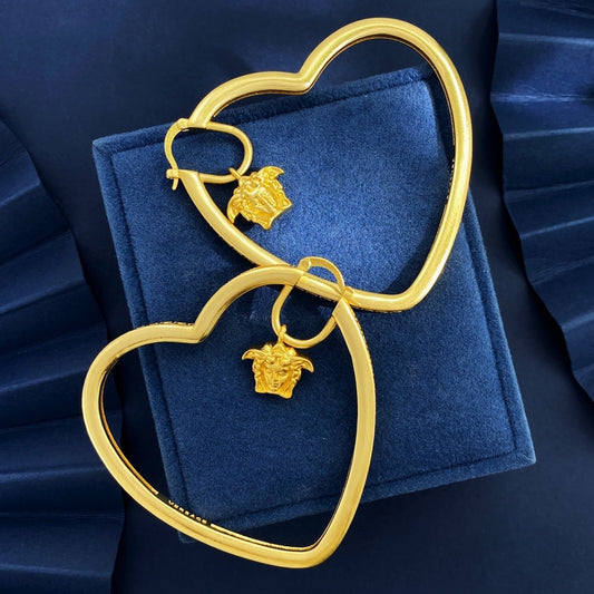 Versace Gold Brass Heart Earrings