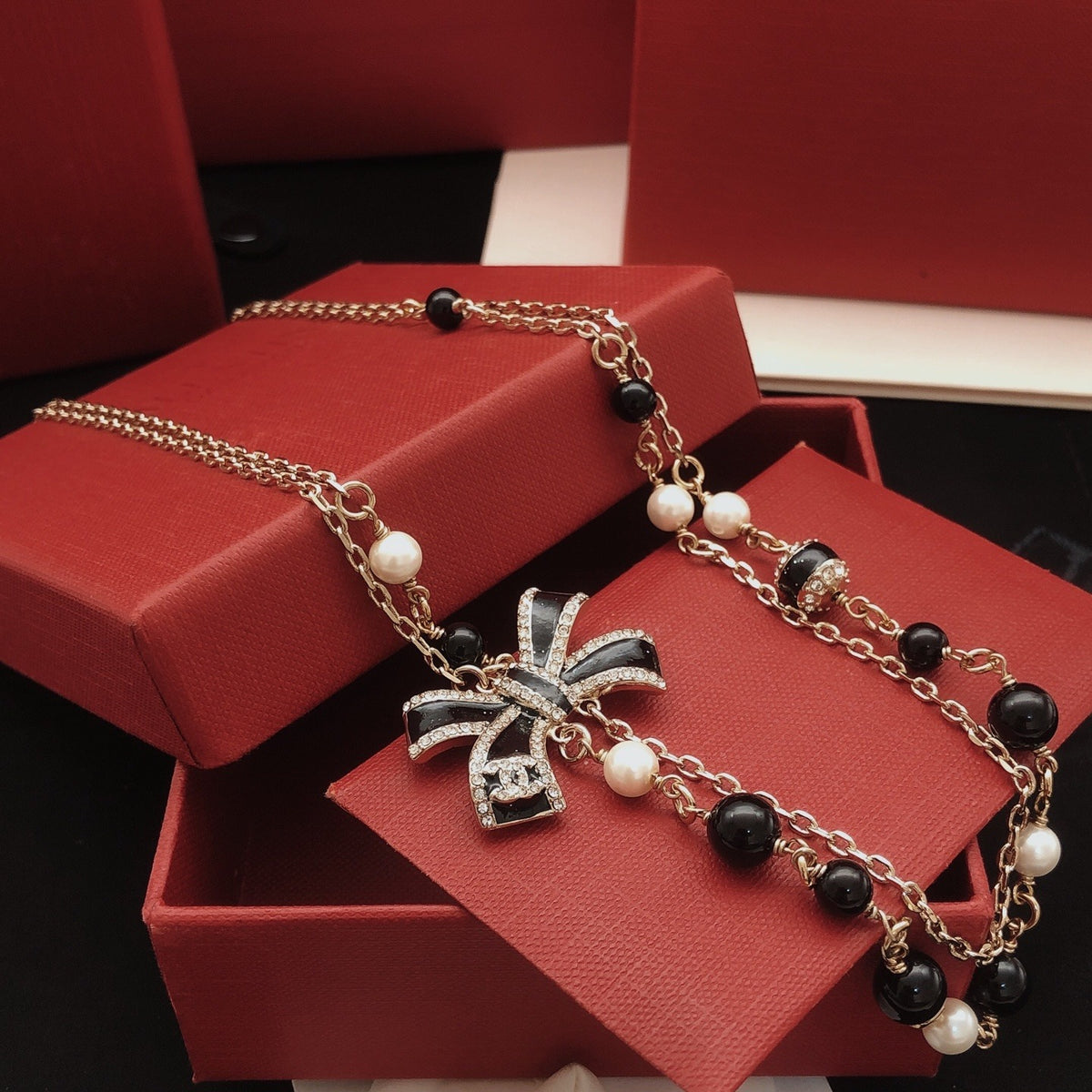 Chanel Black Brass Bow Necklace