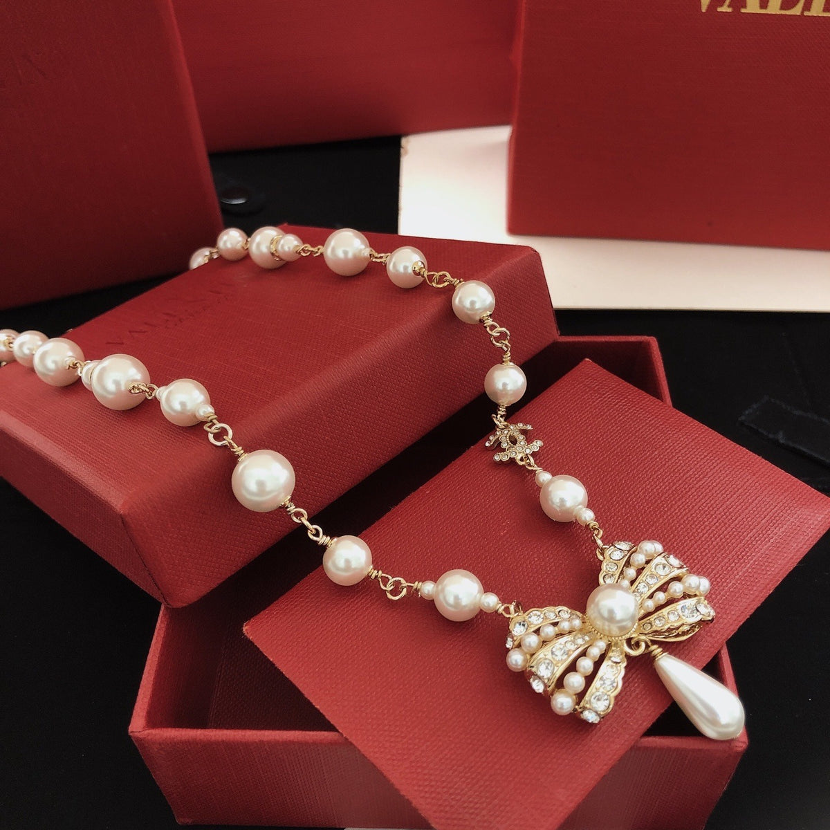 Chanel Brass Bow Necklace