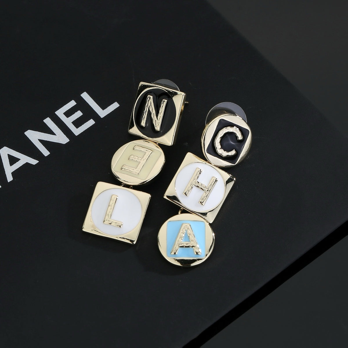 Chanel Logo Earrings