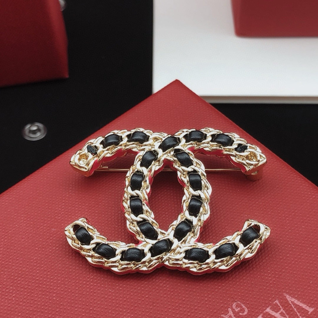 Chanel Leather Brooch