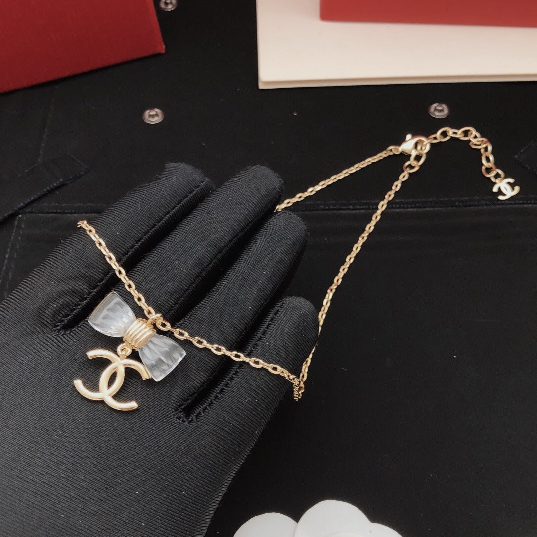 Chanel Brass Bow Necklace