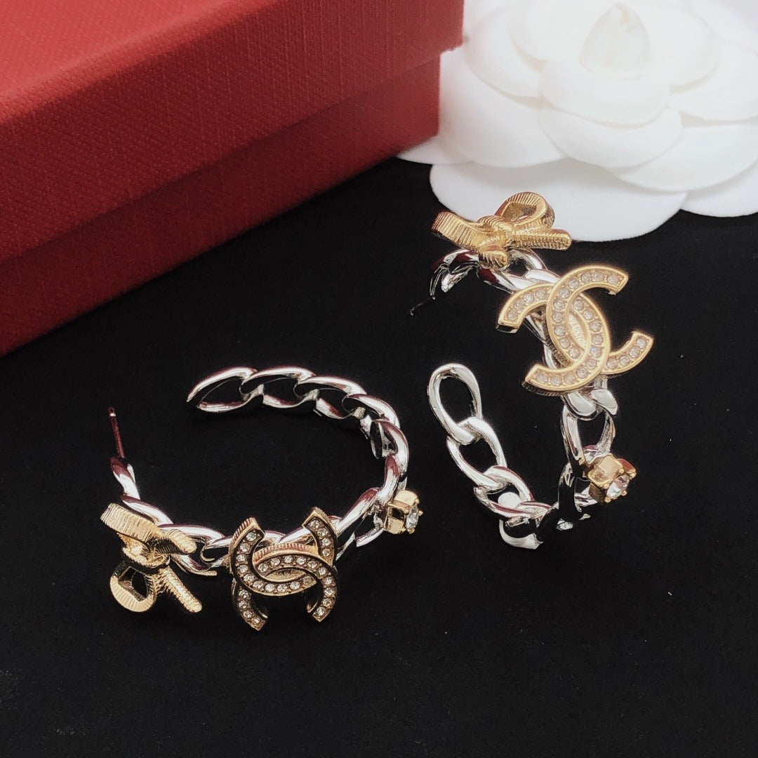 Chanel Brass Bow Earrings