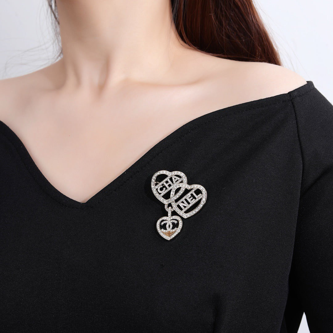 Chanel Brass Brooch