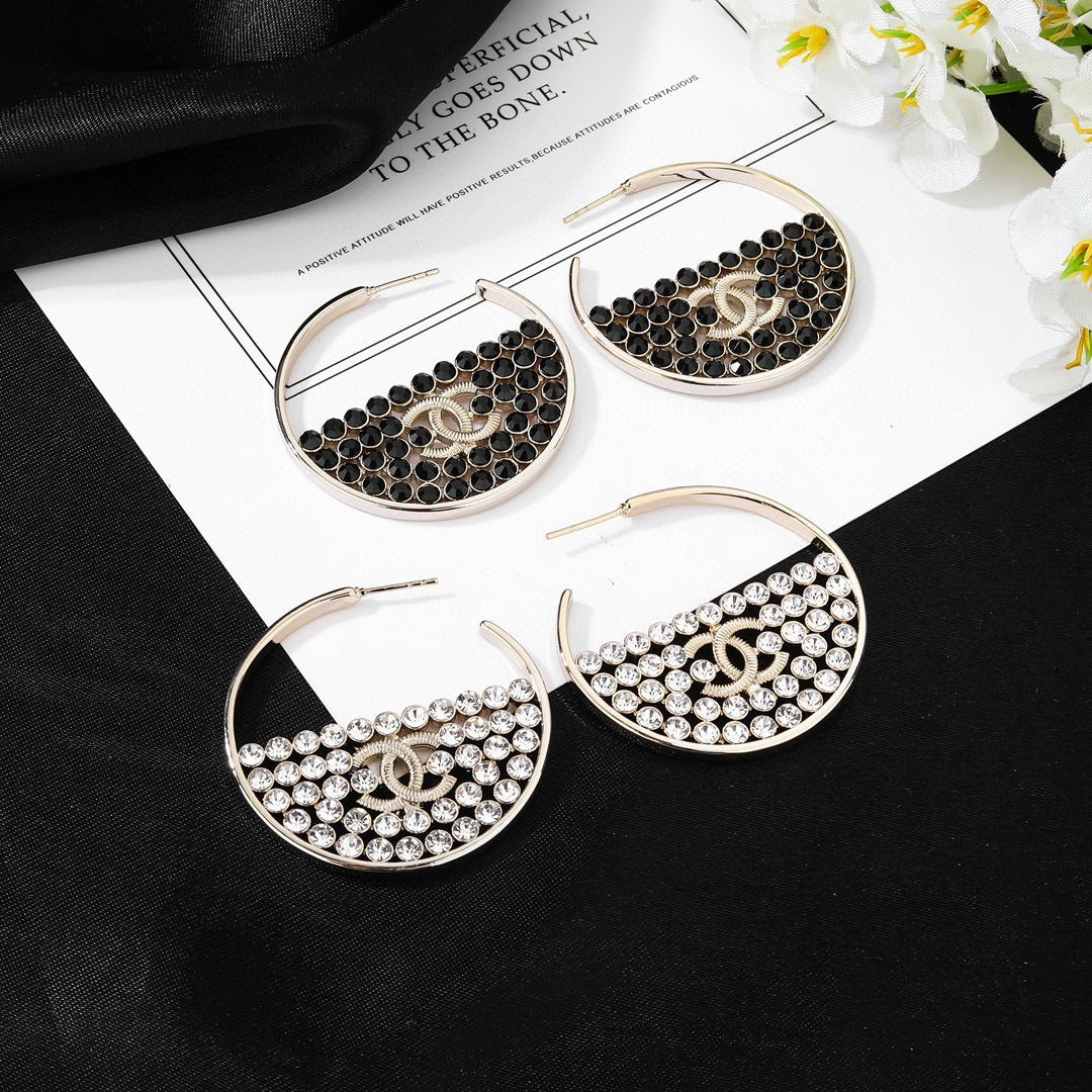 Chanel Logo Earrings