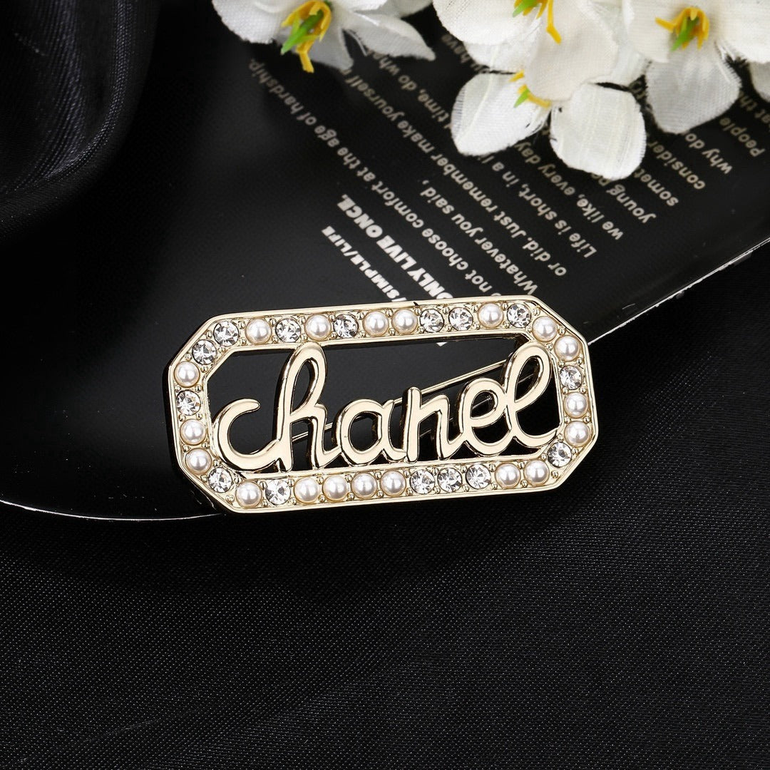 Chanel Logo Brooch