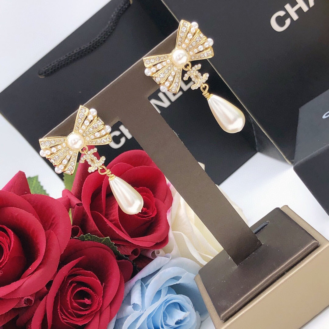 Chanel Brass Bow Earrings