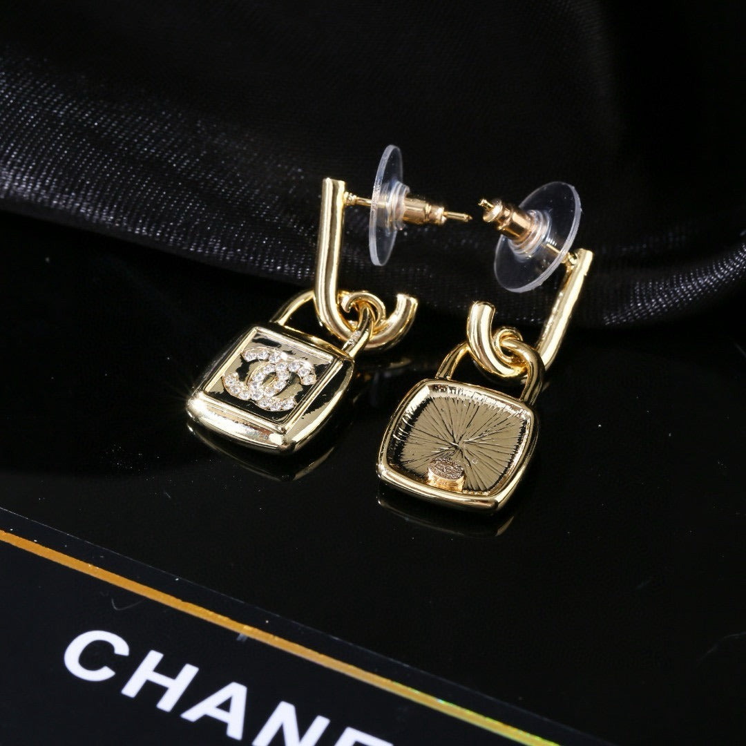 Chanel Brass Lock Earrings