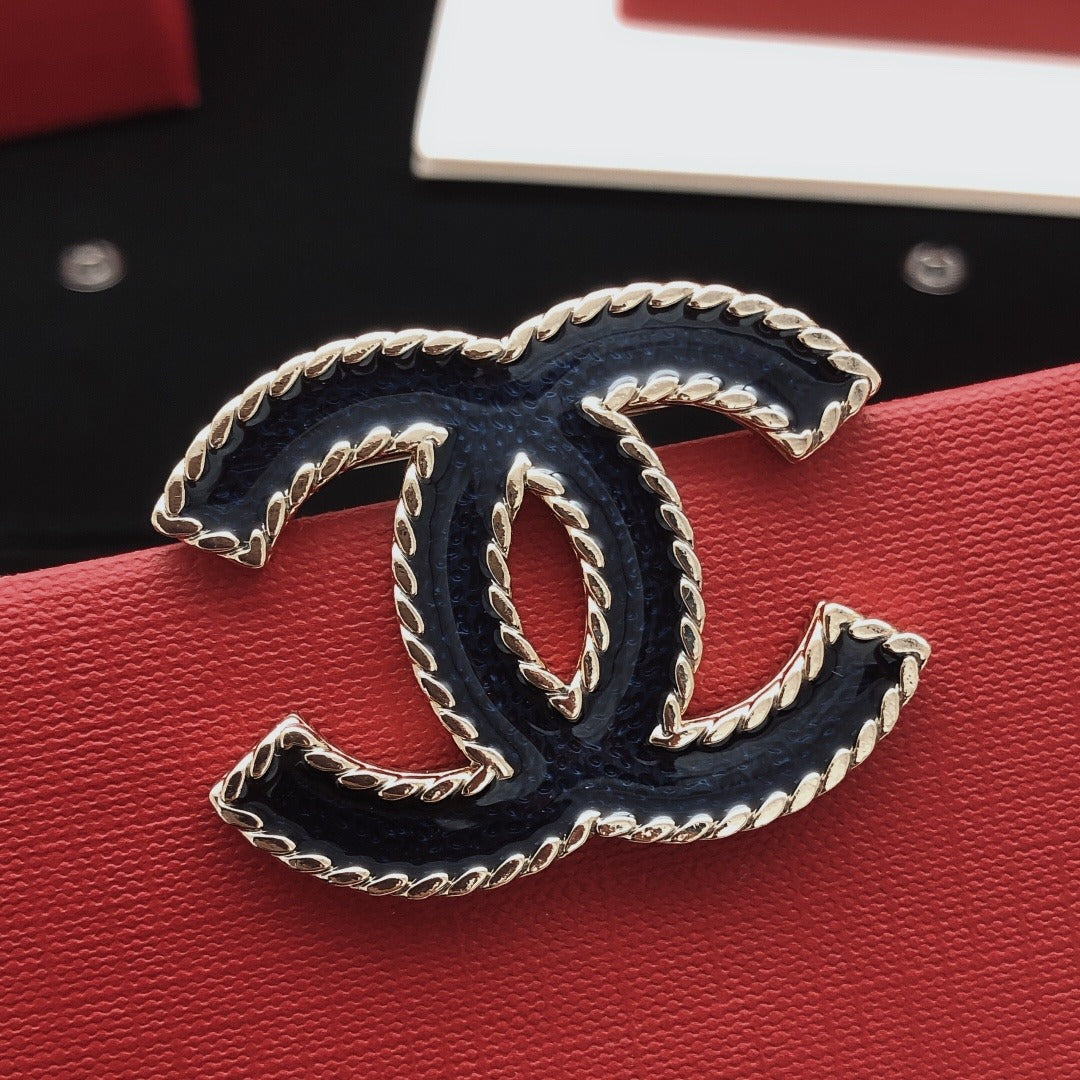 Chanel Brass Brooch