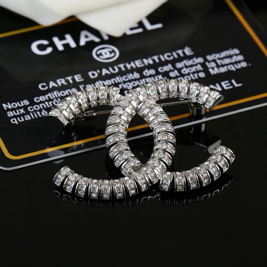 Chanel Brass Brooch