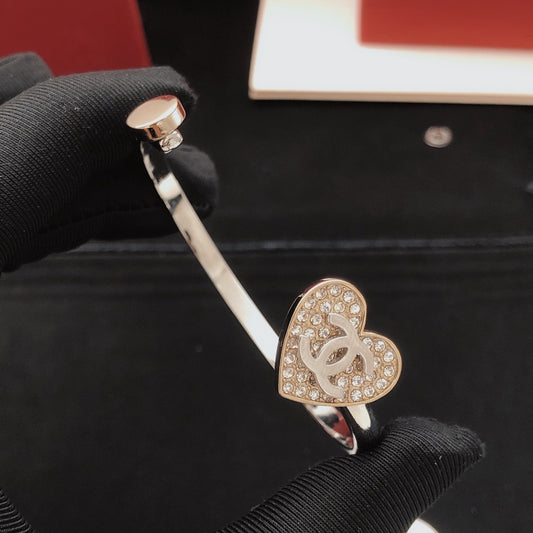 Chanel Gold Brass Heart Bracelet