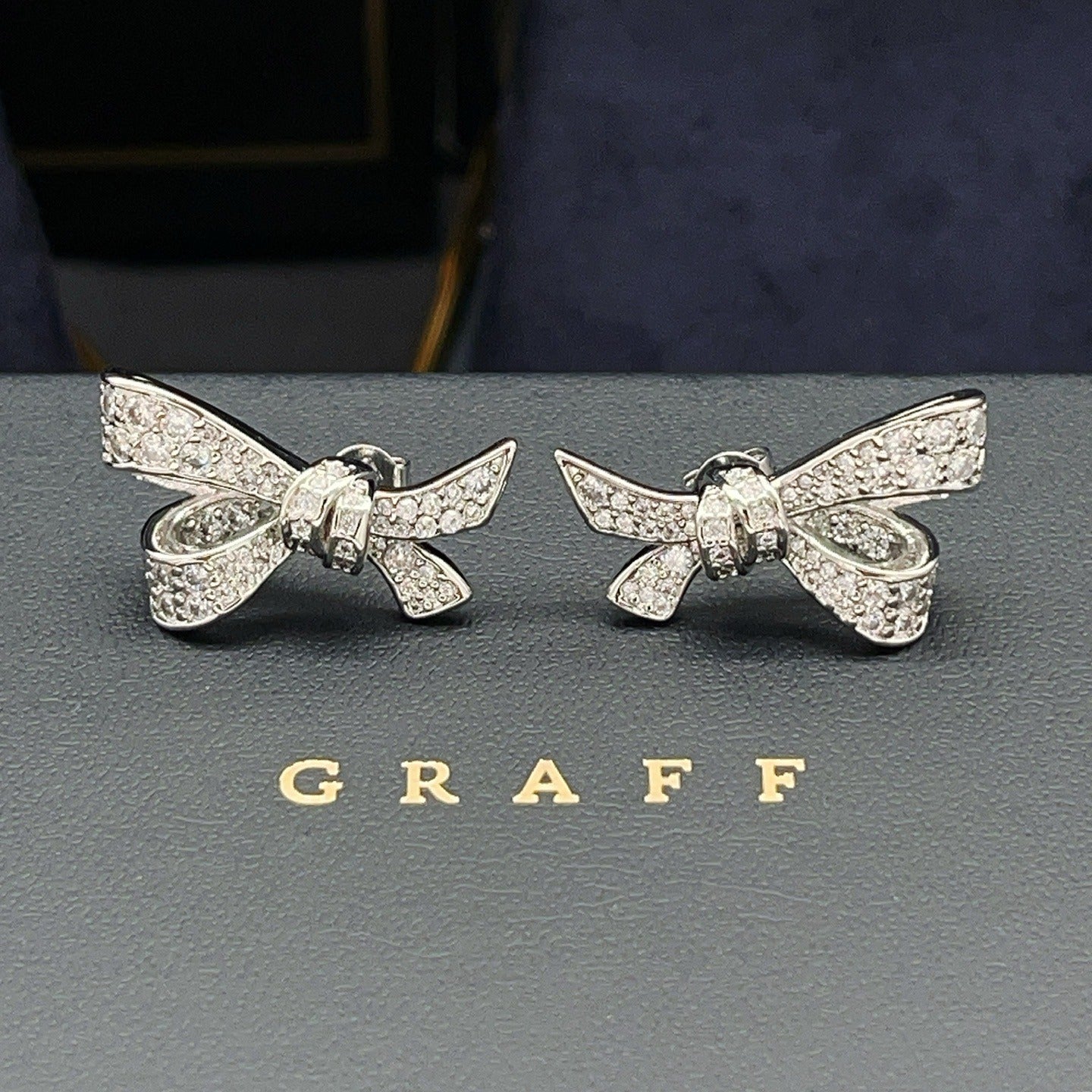 Graff Silver Brass Bow Earrings