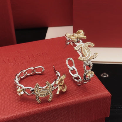 Chanel Brass Bow Earrings