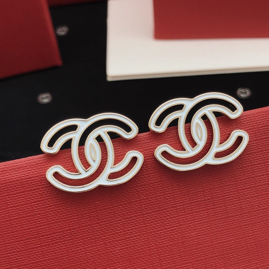 Chanel White Brass Openwork Earrings