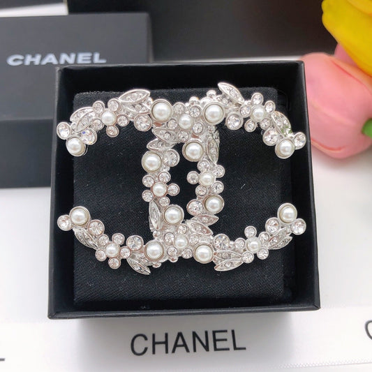 Chanel Silver Logo Brooch