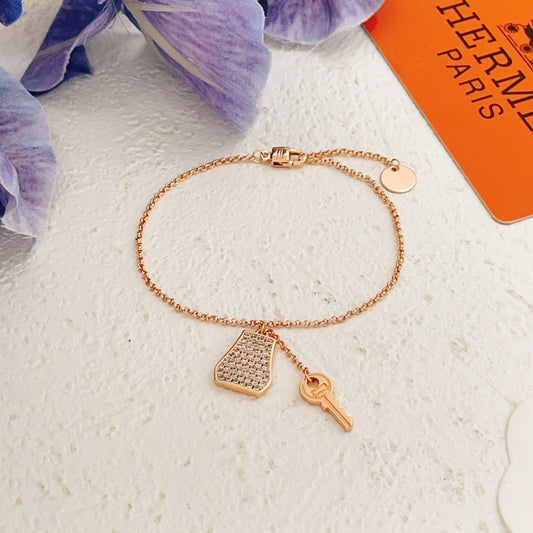 Hermes Brass Tassel Bracelet