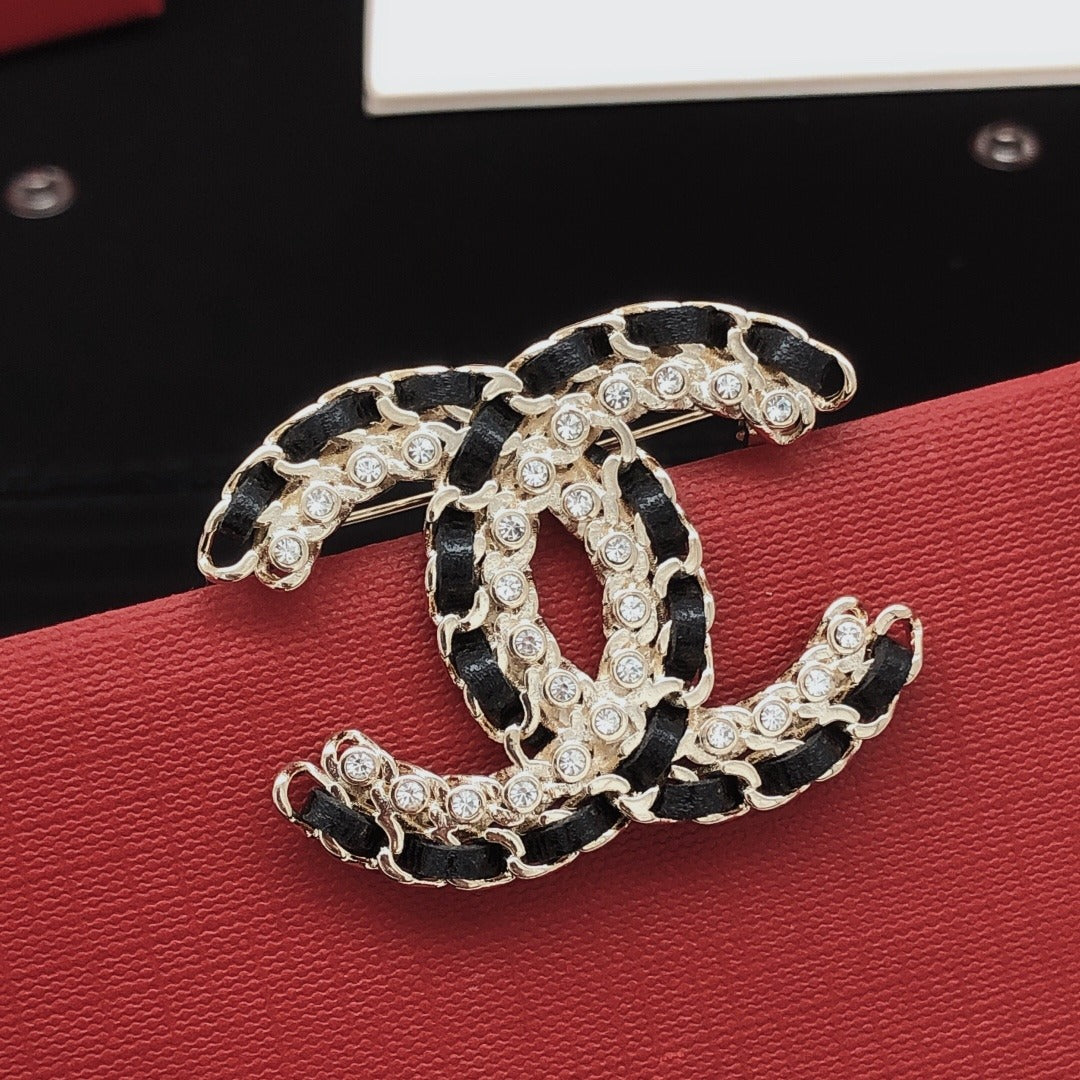 Chanel Leather & Brass Brooch