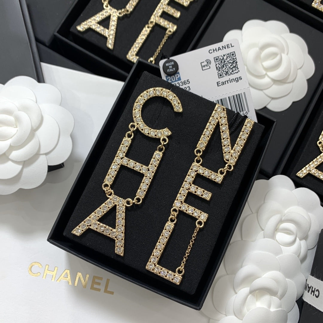 Chanel Brass & Sterling Silver Logo Earrings