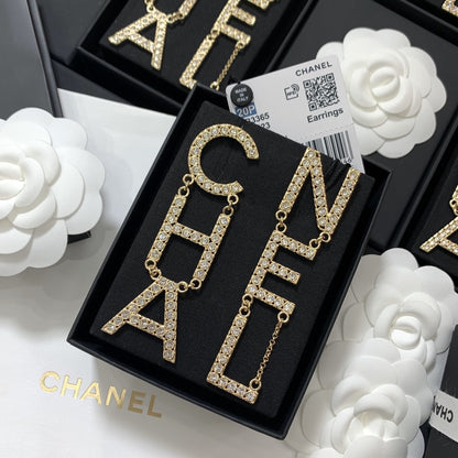 Chanel Brass & Sterling Silver Logo Earrings