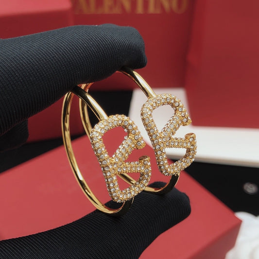 Valentino Brass Round Earrings