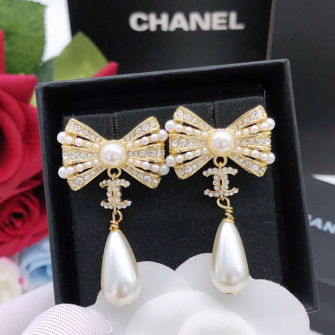 Chanel Brass Bow Earrings