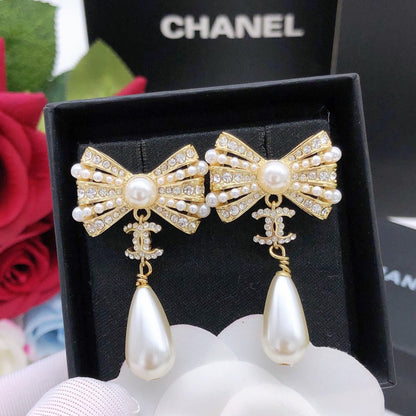 Chanel Brass Bow Earrings