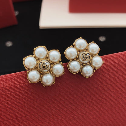 Gucci Gold Brass Floral Earrings