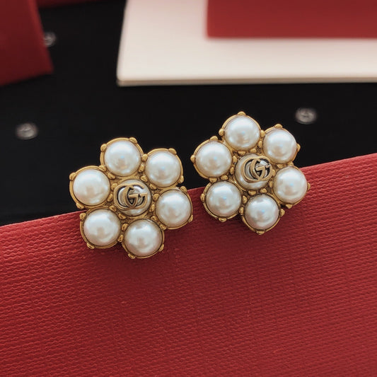 Gucci Gold Brass Floral Earrings