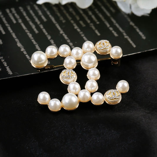 Chanel Brass Pearl Brooch