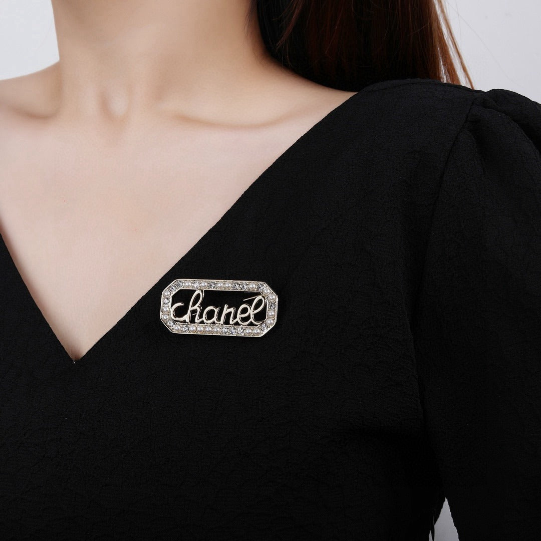 Chanel Logo Brooch