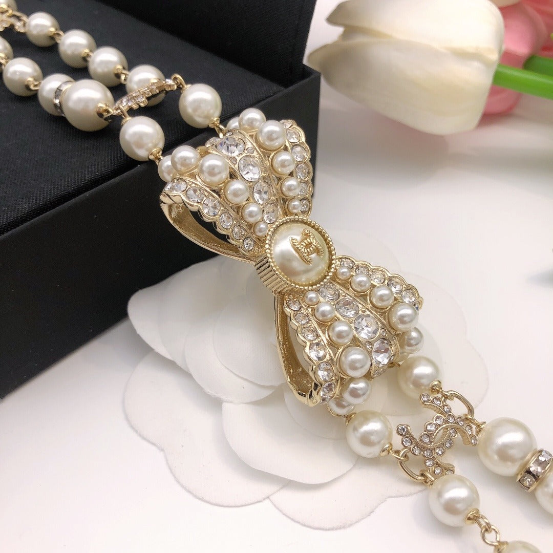 Chanel Brass & Sterling Silver Bow Necklace