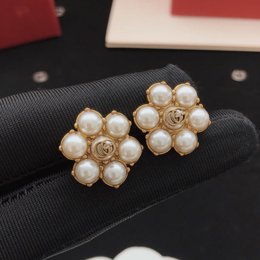 Gucci Gold Brass Floral Earrings