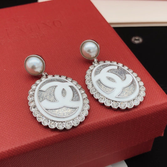 Chanel White Brass Round Earrings