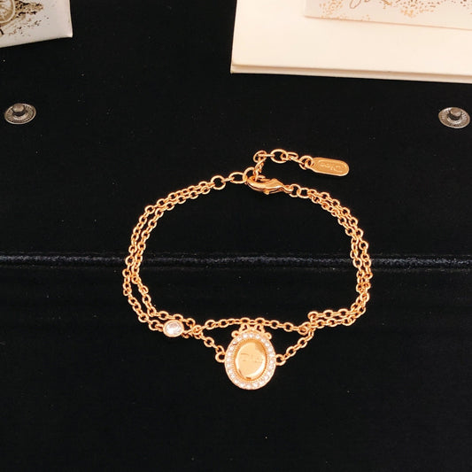 Dior Gold Brass Round Bracelet