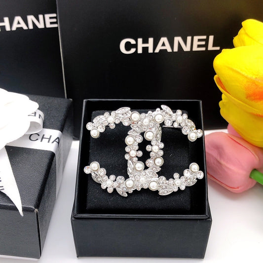 Chanel Silver Logo Brooch