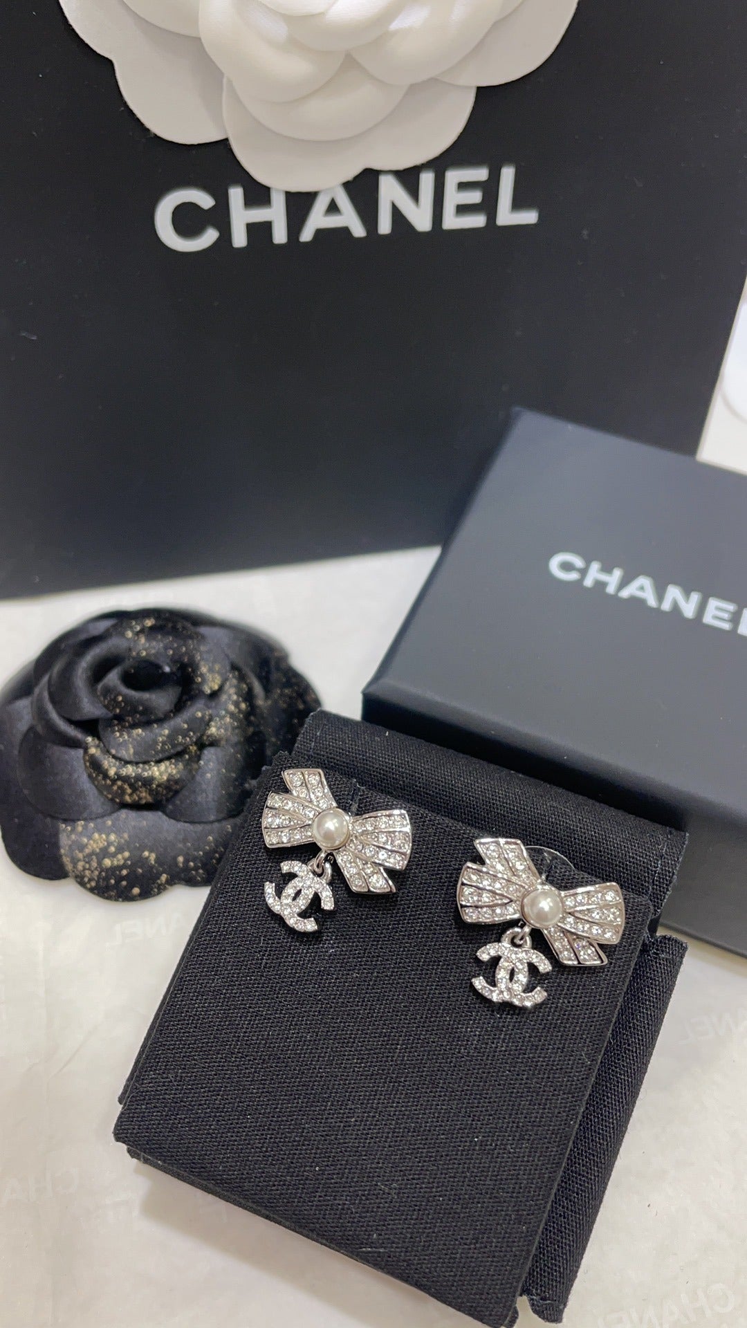 Chanel Silver Bow Earrings