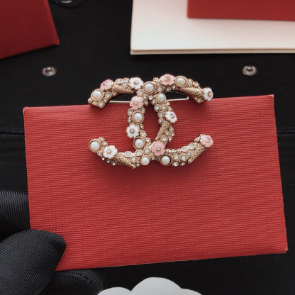 Chanel Pink Brass Brooch
