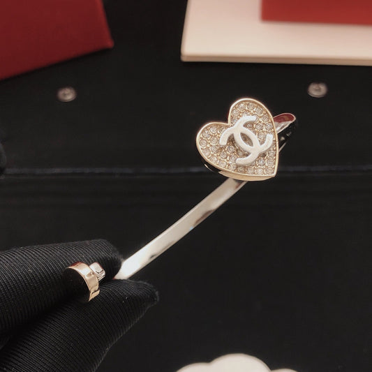 Chanel Gold Brass Heart Bracelet