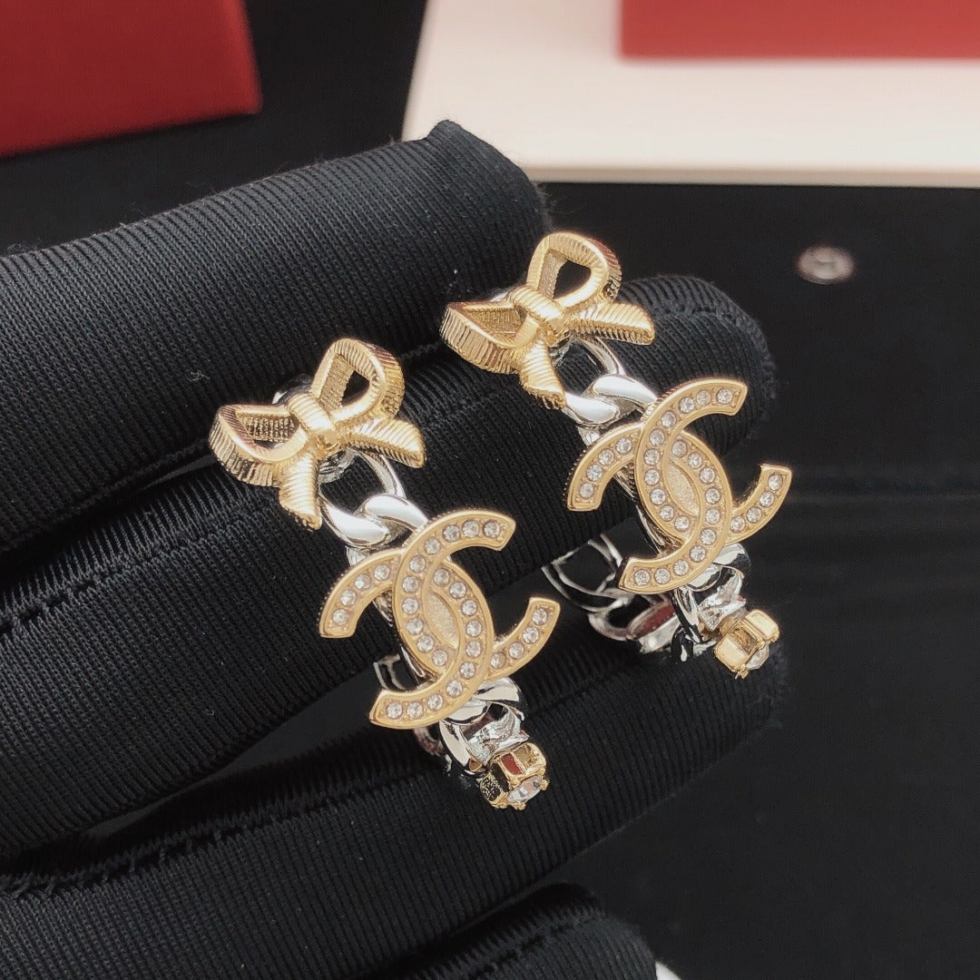 Chanel Brass Bow Earrings