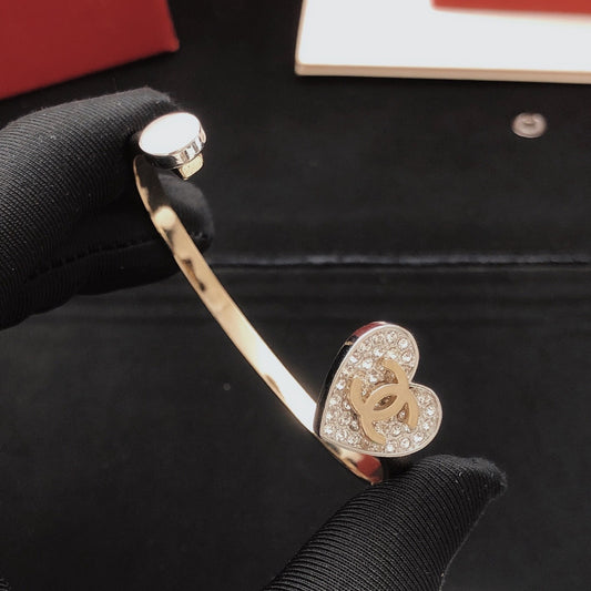 Chanel Silver Brass Heart Bracelet