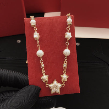 Chanel Brass Star Necklace