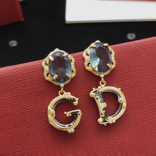 Unbranded Black Brass Logo Earrings