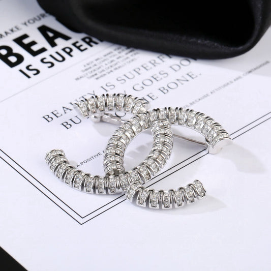 Chanel Brass Brooch